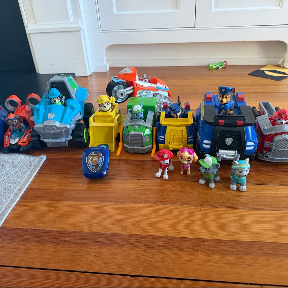 Assorted Paw Patrol Vehicles and figures
